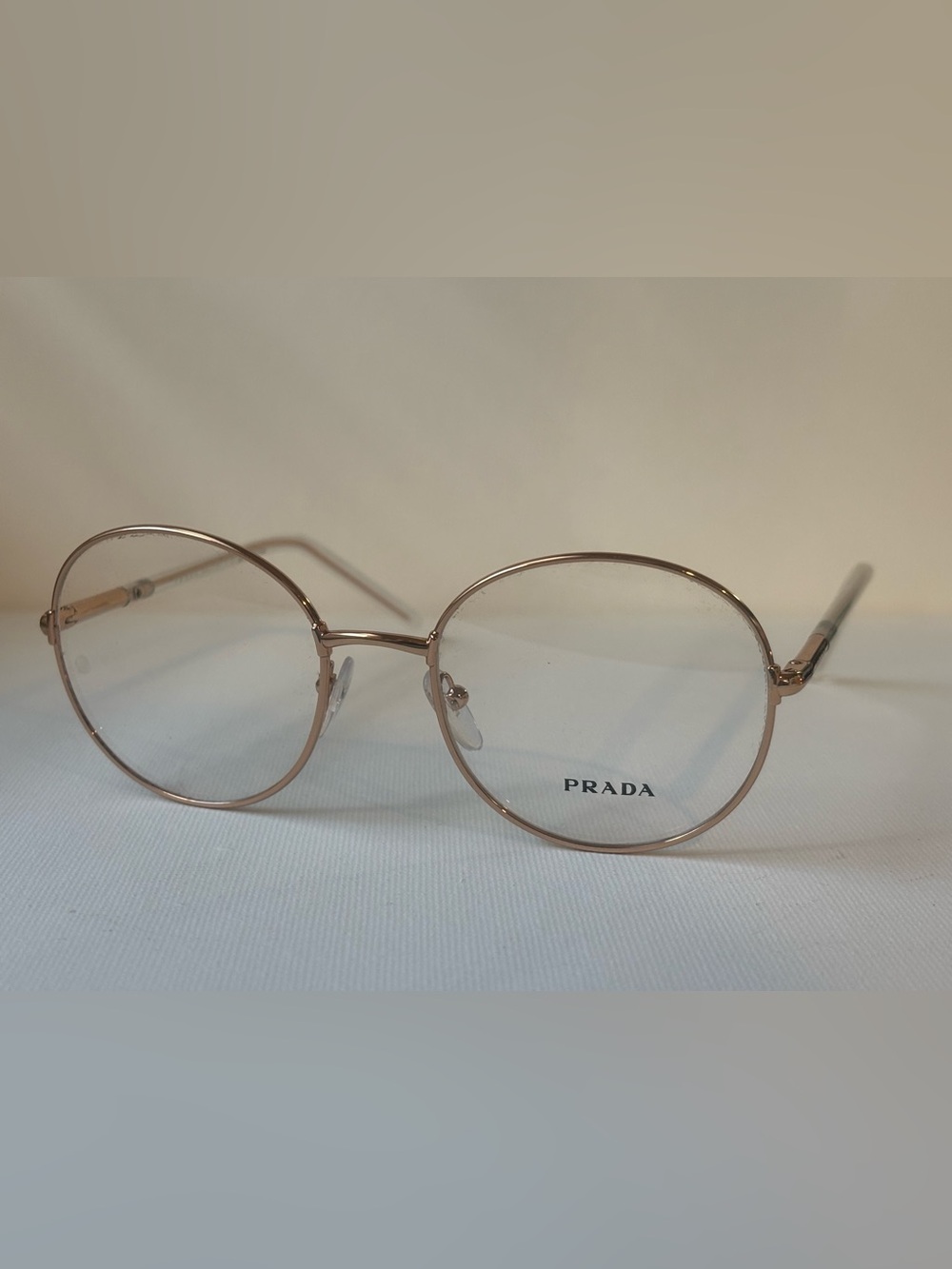 Prada Round Women's Metal Frame Glasses in Rose Gold Tone